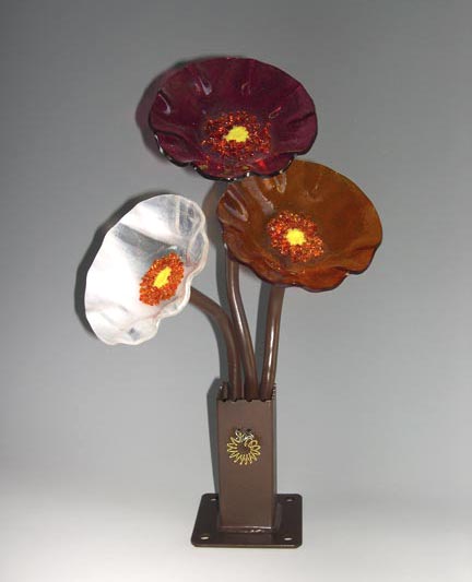 Glass poppies in a vase